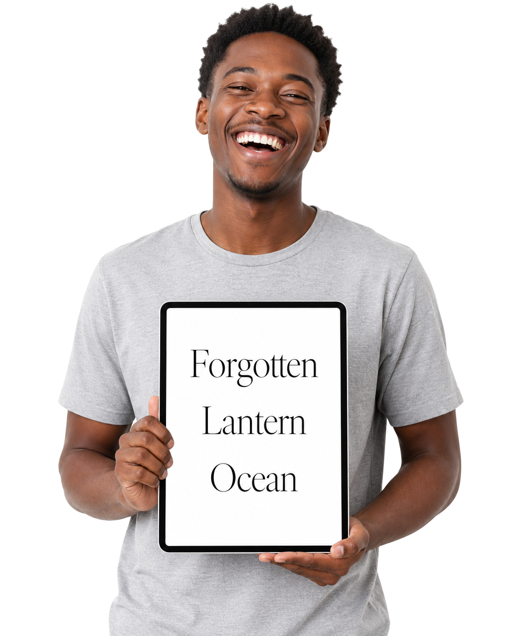 A young man laughing at a tablet, which reads Forgotten, Lantern, Ocean
